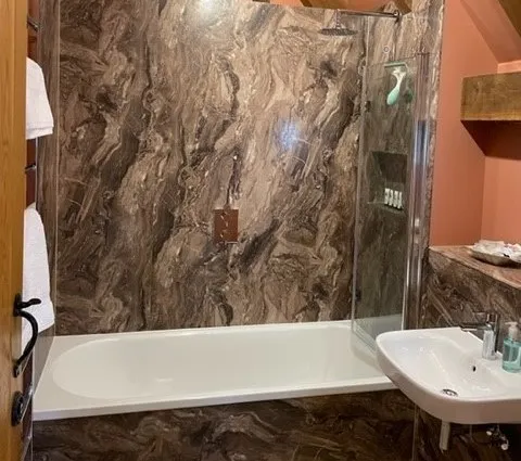 Opulent barn bathroom